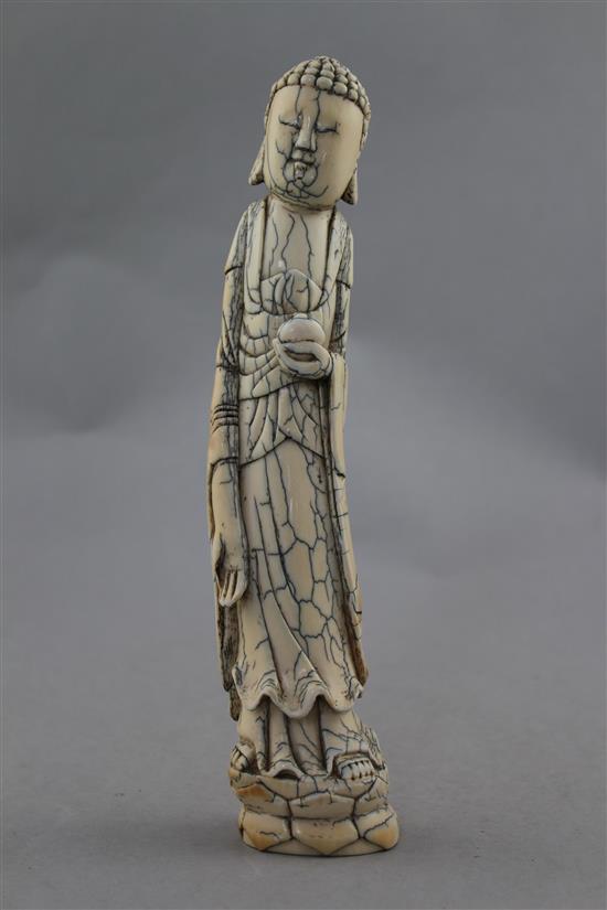 A Chinese ivory tusk carving of Buddha, Qing dynasty, 23.5cm.